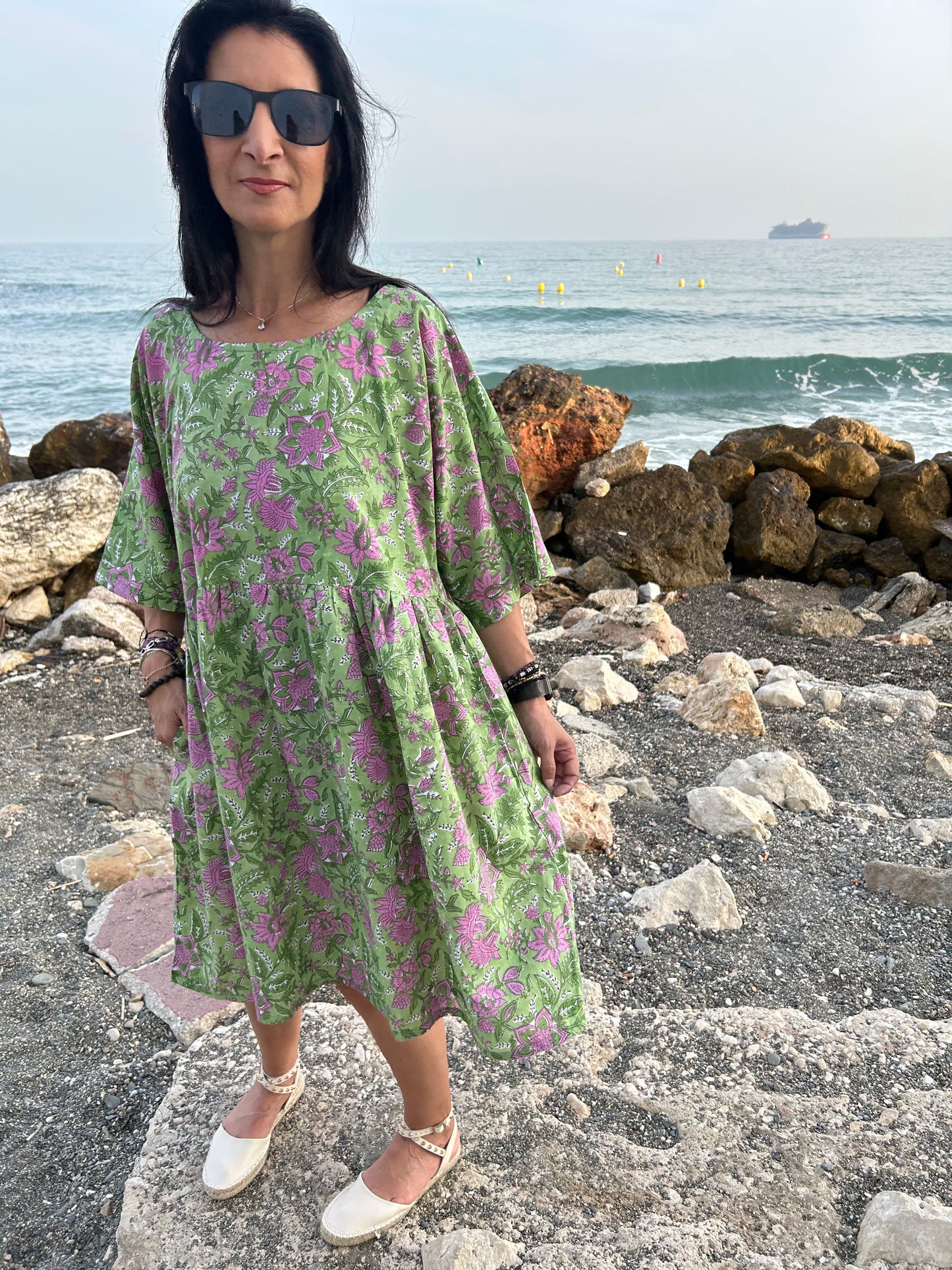 Purple flowers in a green garden Tunic