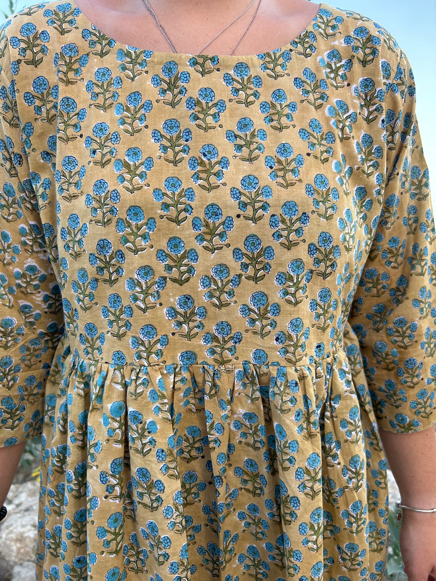 beige floral tunic or dress