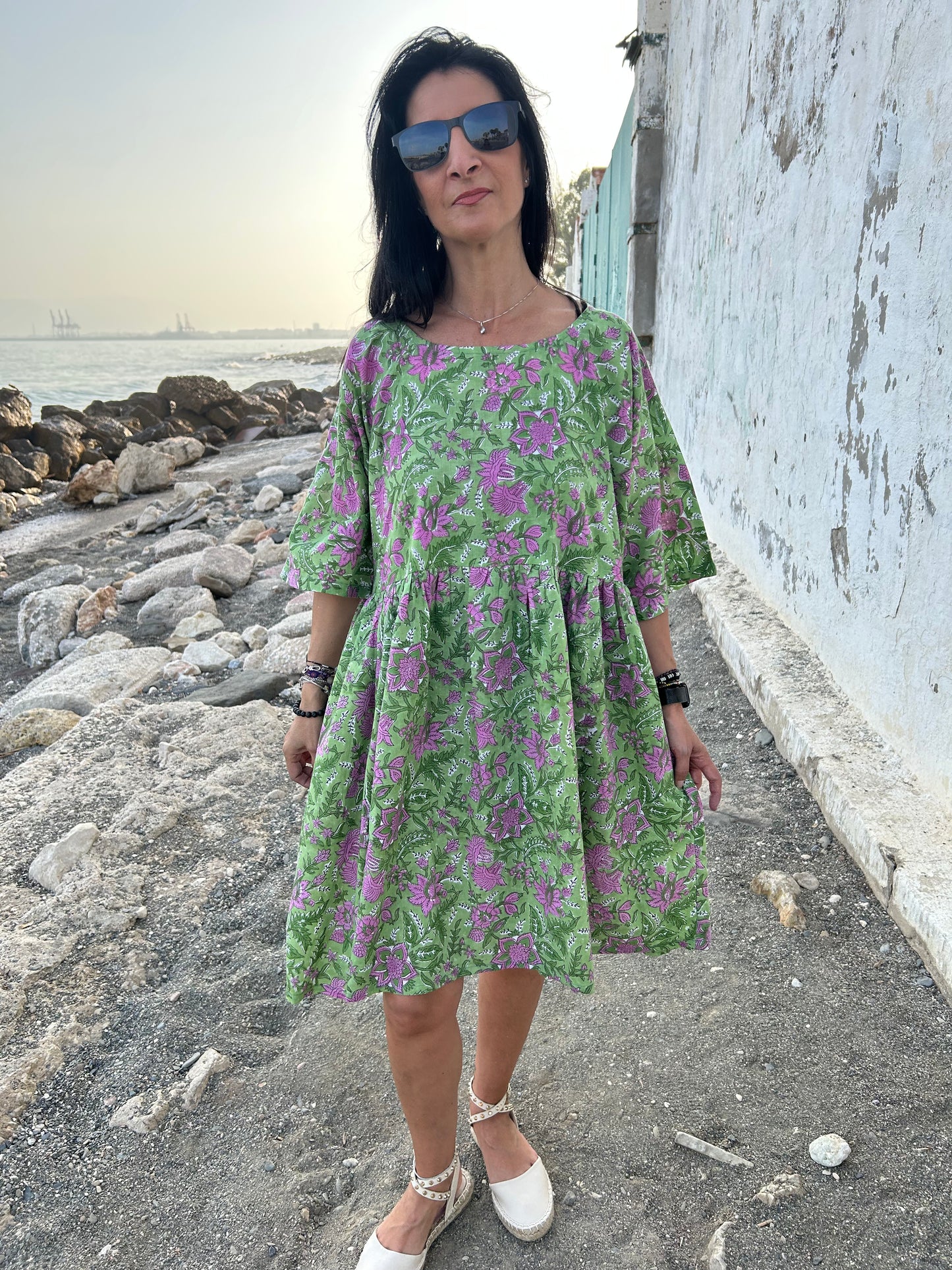 Purple flowers in a green garden Tunic