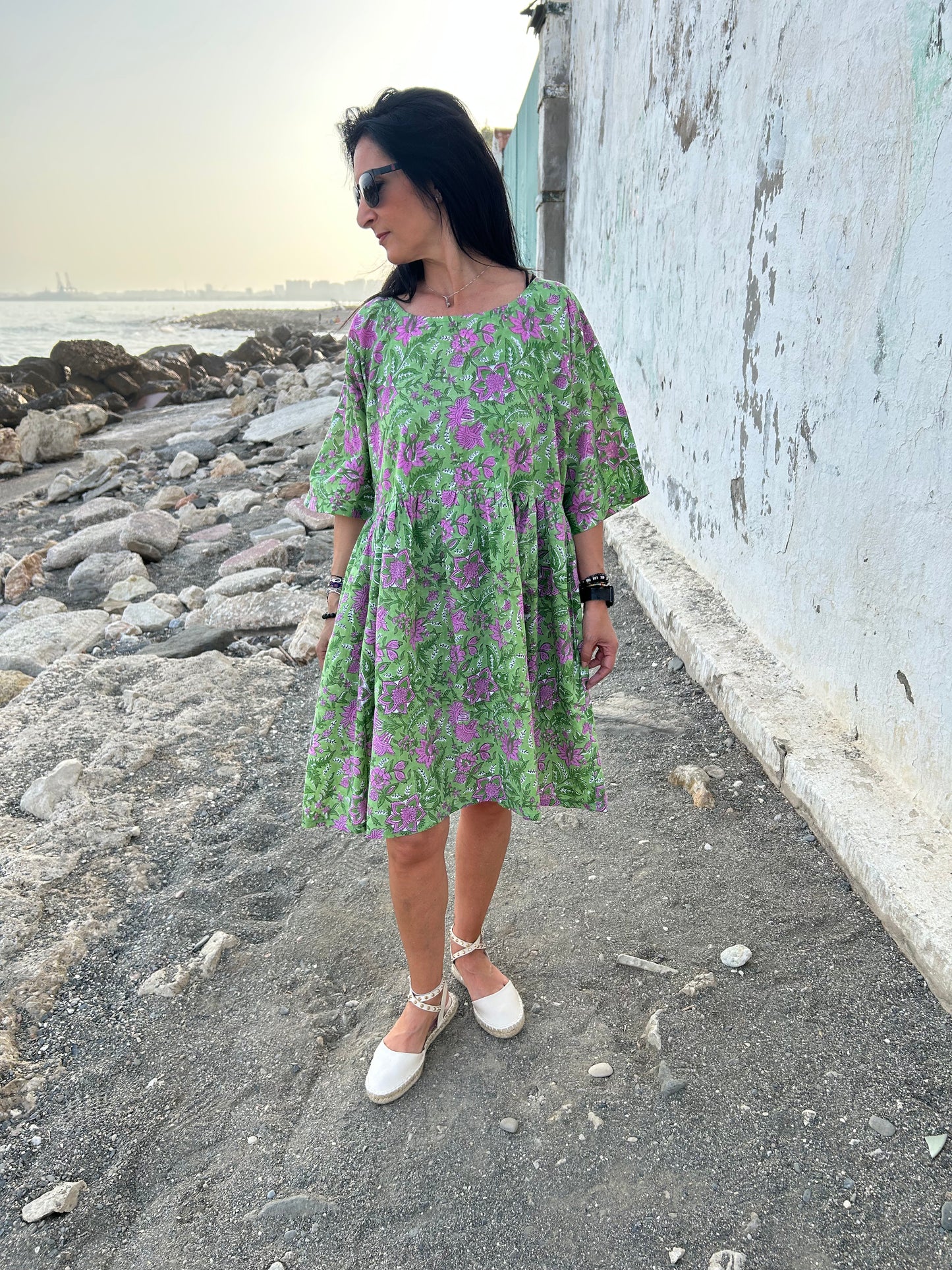 Purple flowers in a green garden Tunic