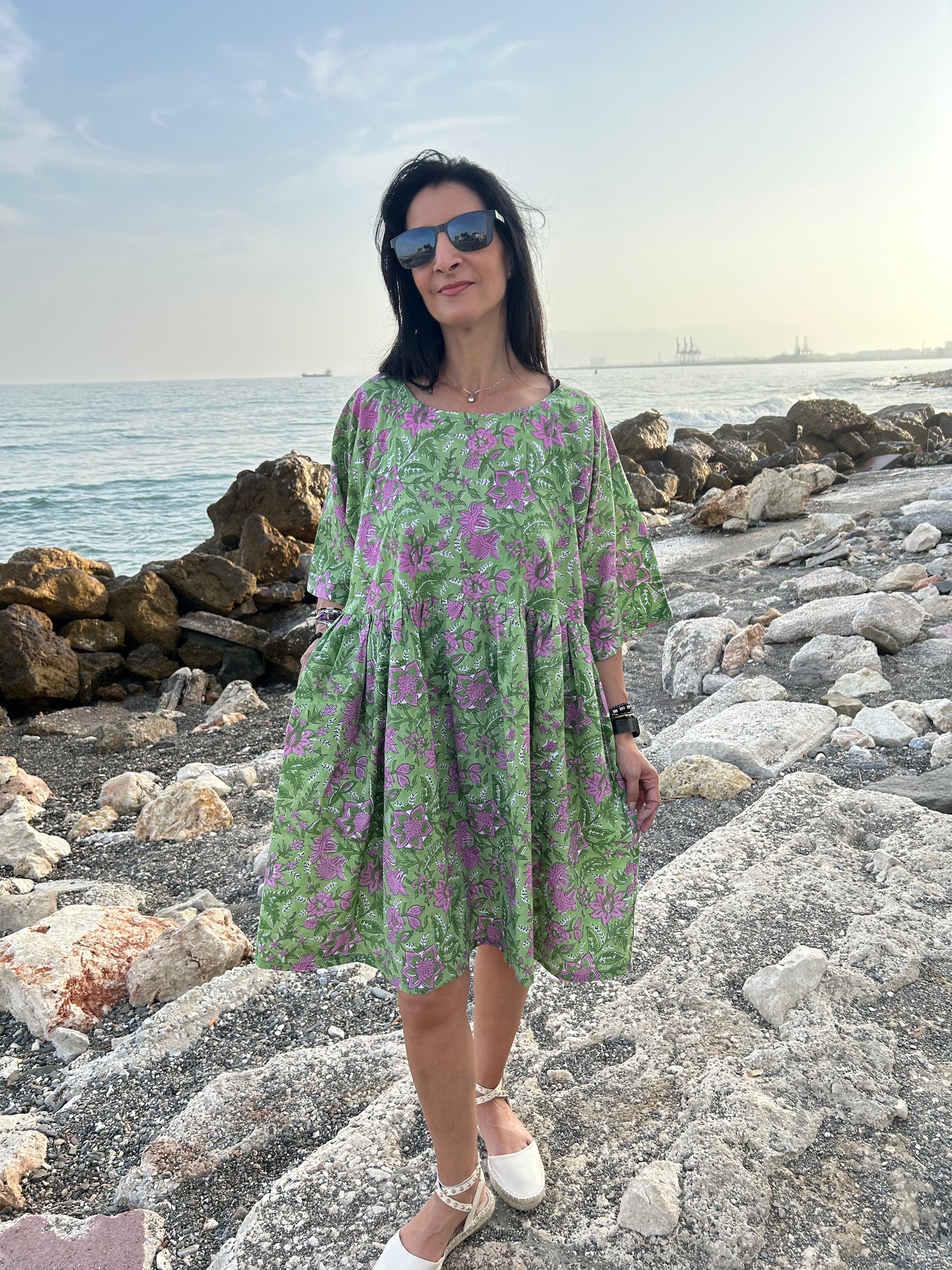 Purple flowers in a green garden Tunic