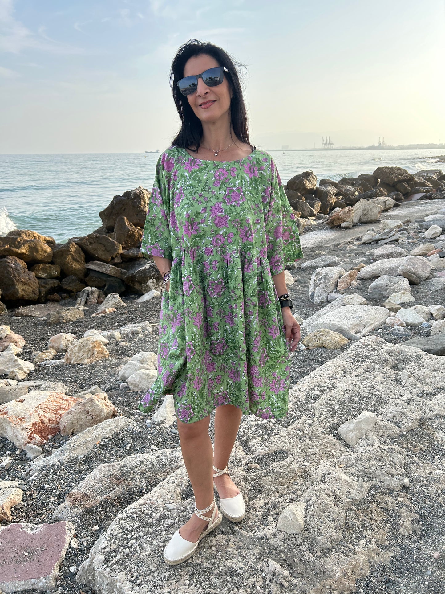 Purple flowers in a green garden Tunic