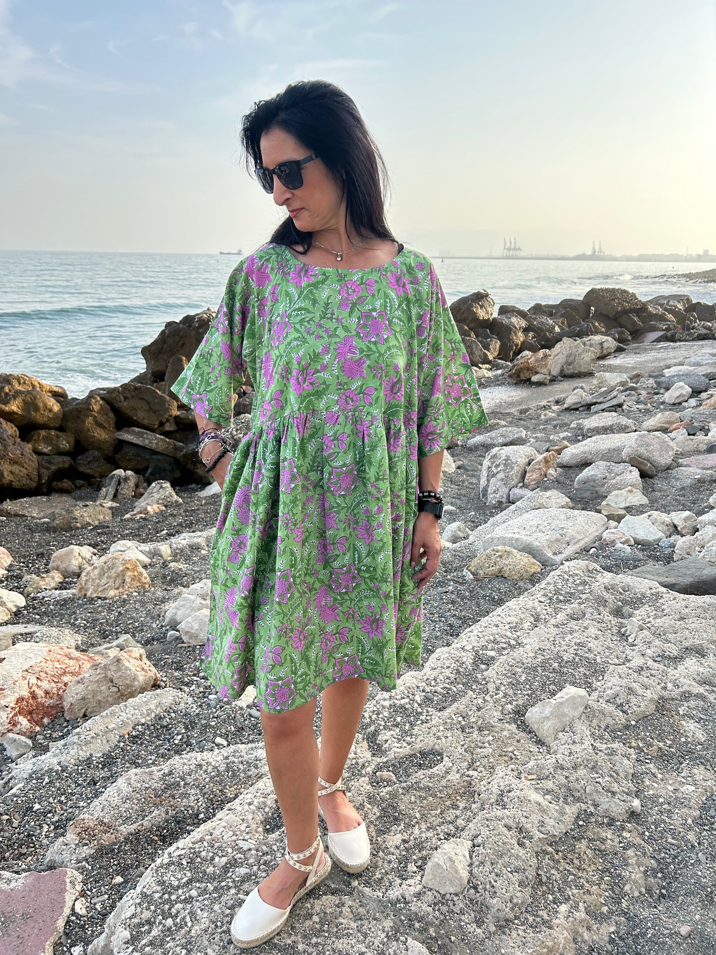 Purple flowers in a green garden Tunic