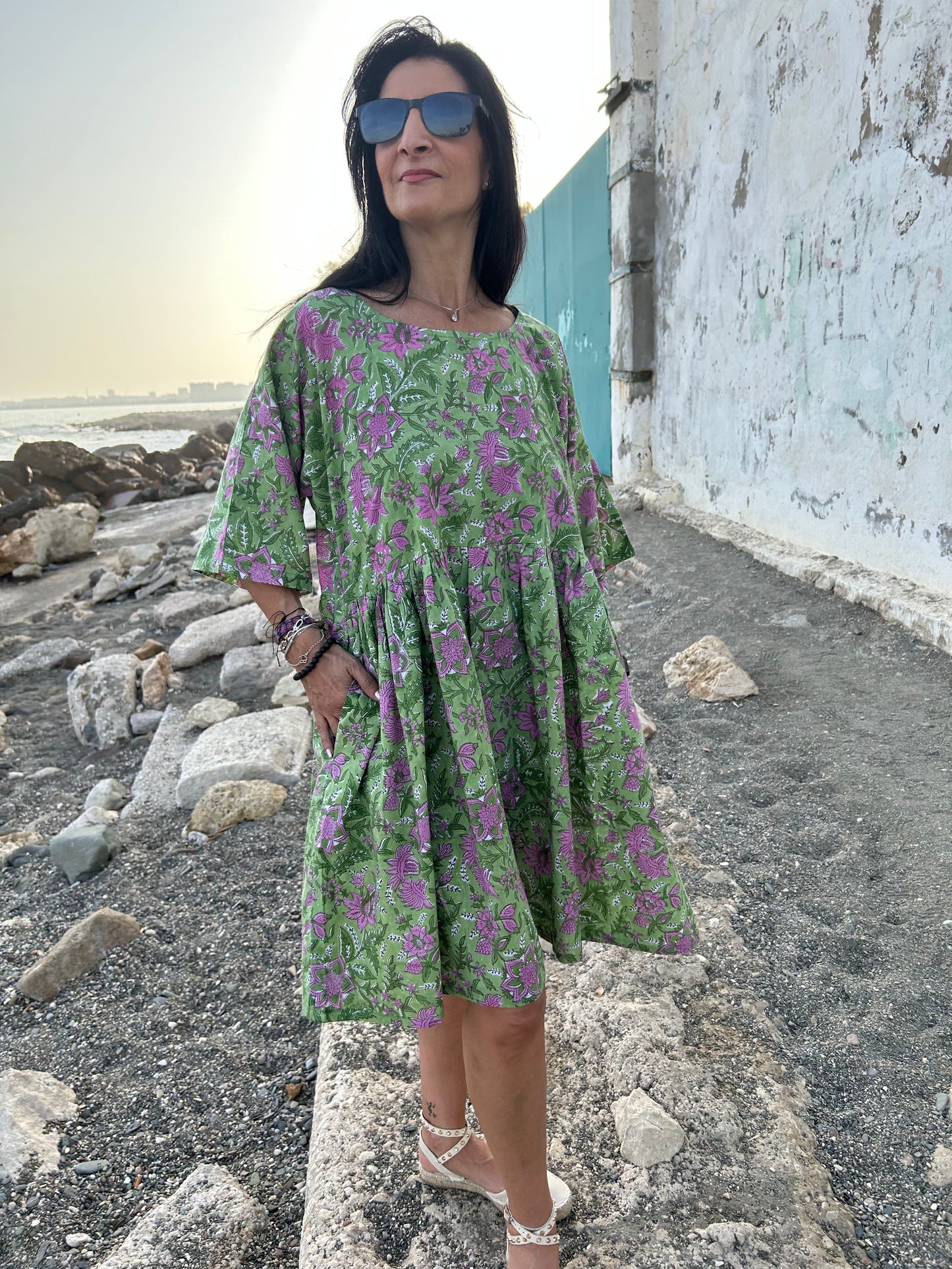 Purple flowers in a green garden Tunic