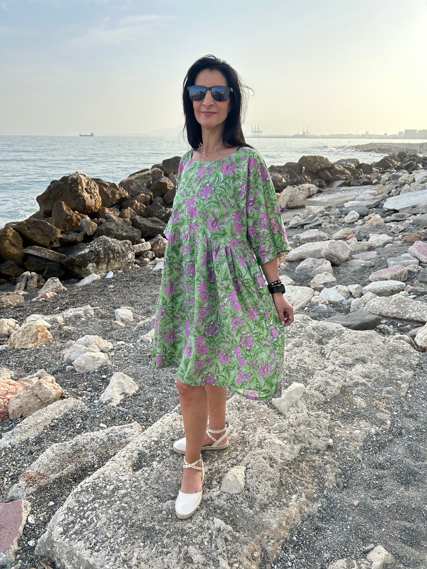 Purple flowers in a green garden Tunic