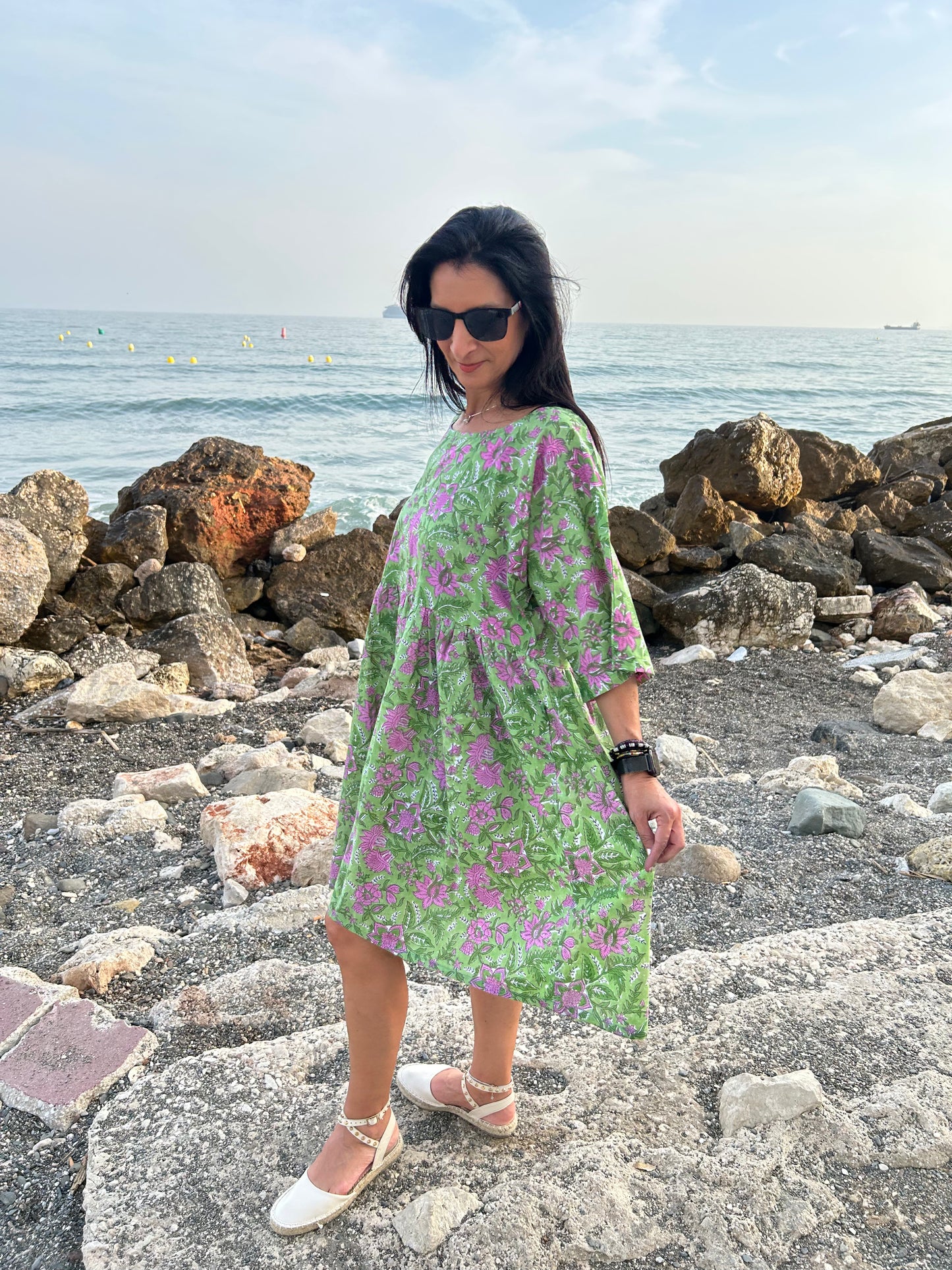 Purple flowers in a green garden Tunic